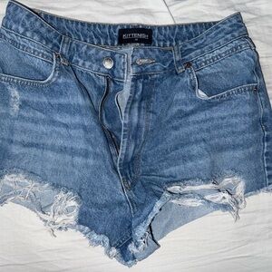 Kittenish Light Blue Distressed Denim Cutoff Shorts
